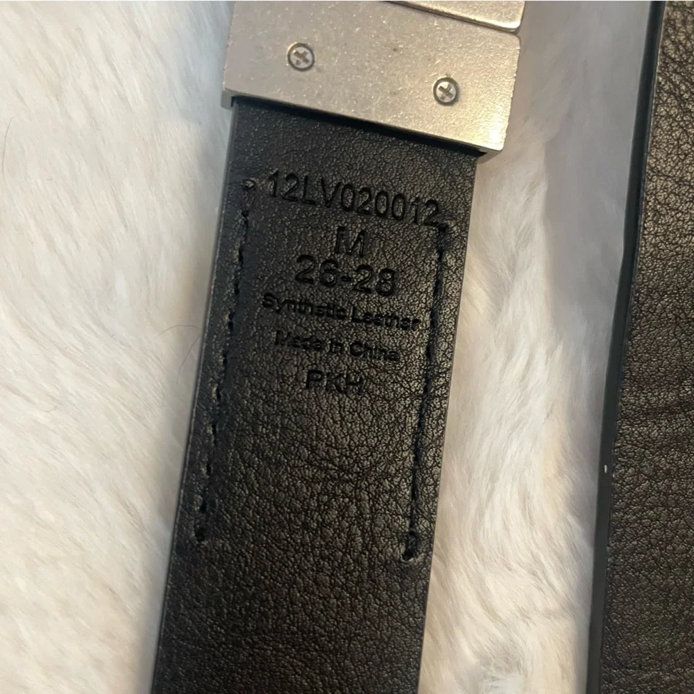 Levi’s Big Boys Reversible black and brown leather belt with silver buckle, M